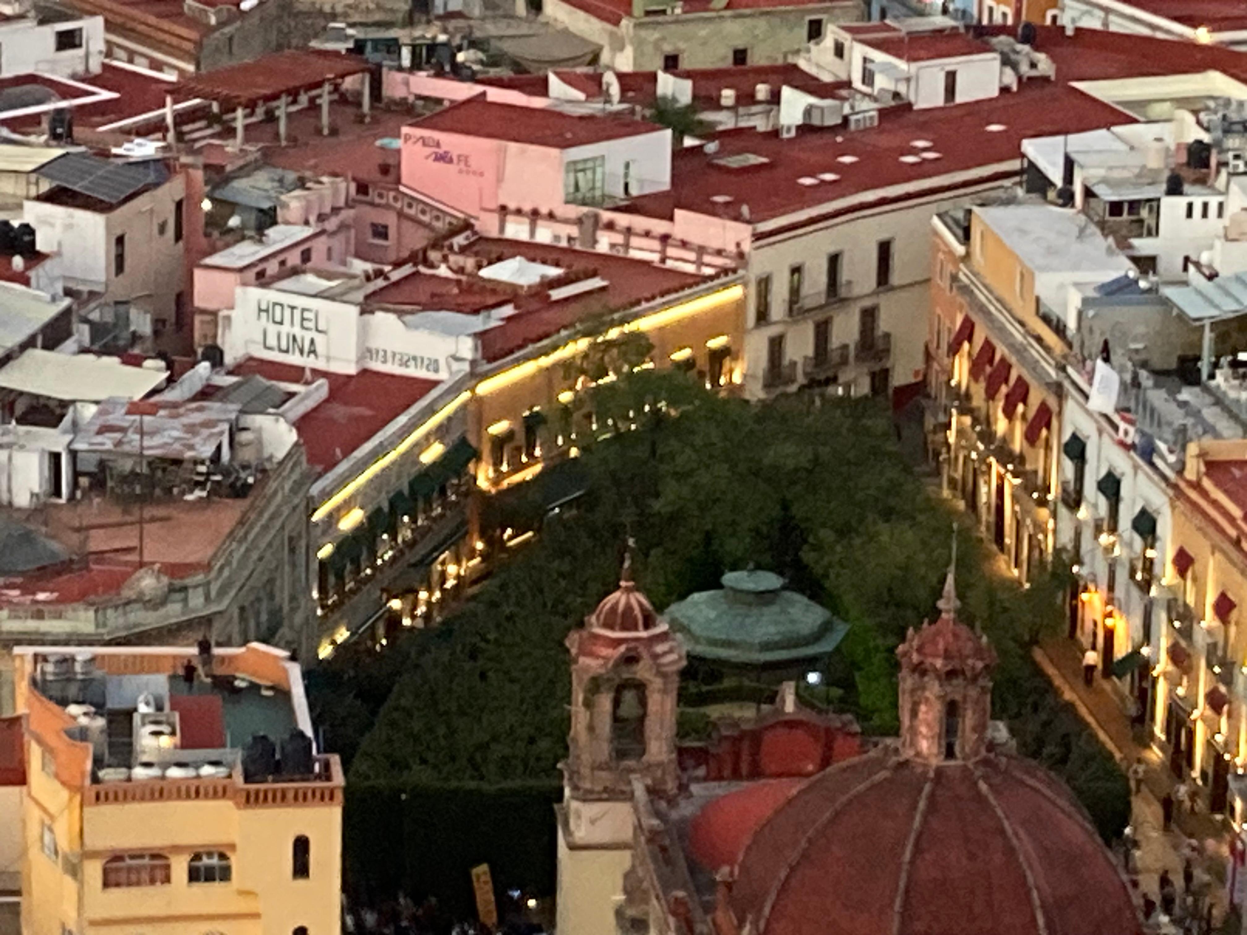 View of the hotel and plaza from the hilltop nearby 