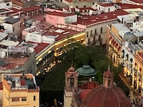 View of the hotel and plaza from the hilltop nearby