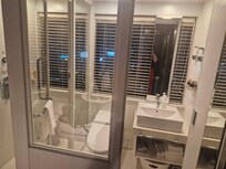 That's just the bathroom, the shower is to the left!