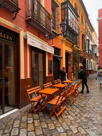 Servers preparing for the day at Entrecalles restaurant below our apartment