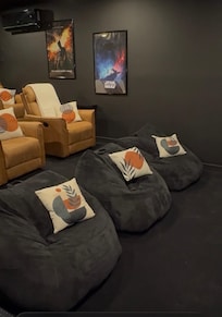 Teens and adults loved the movie theater. So cozy with swivel recliners.