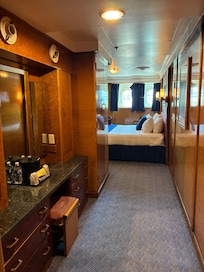 Lovely vanity table and chair with fresh air windows and great closet space!
