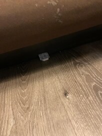 Old butter container under the other side of bed