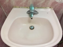 The sink in the bathroom. Pretty sure that’s mold on the grout.