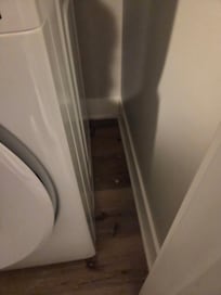 Dust next to the washer.