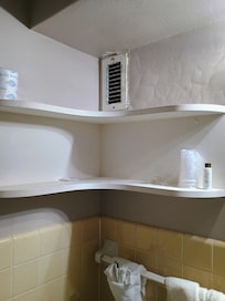 Dirty shelf in bathroom