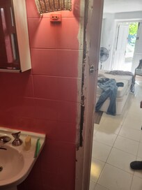 A door facing, or lack of! Just one example of the many areas that require repair.