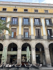 Hotel on floor of this building facing courtyard