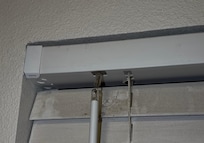 DUST CAKED ON THE BLINDS