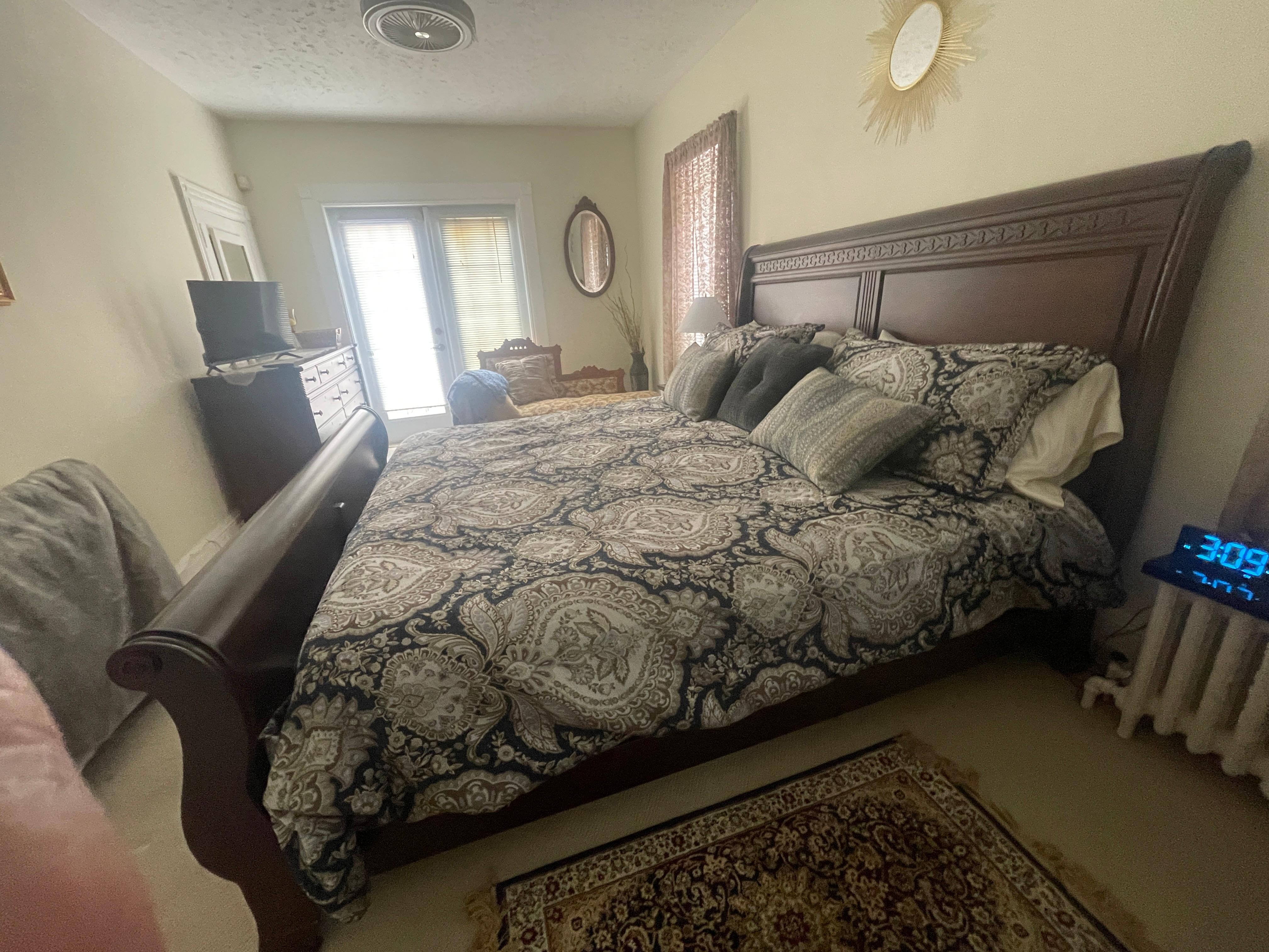 Our gorgeous bedroom with adjoining extra-large balcony with seating.