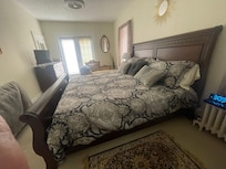 Our gorgeous bedroom with adjoining extra-large balcony with seating.