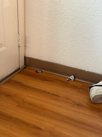 Candy wrappers behind door
