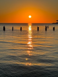 sunset from pier next to the property