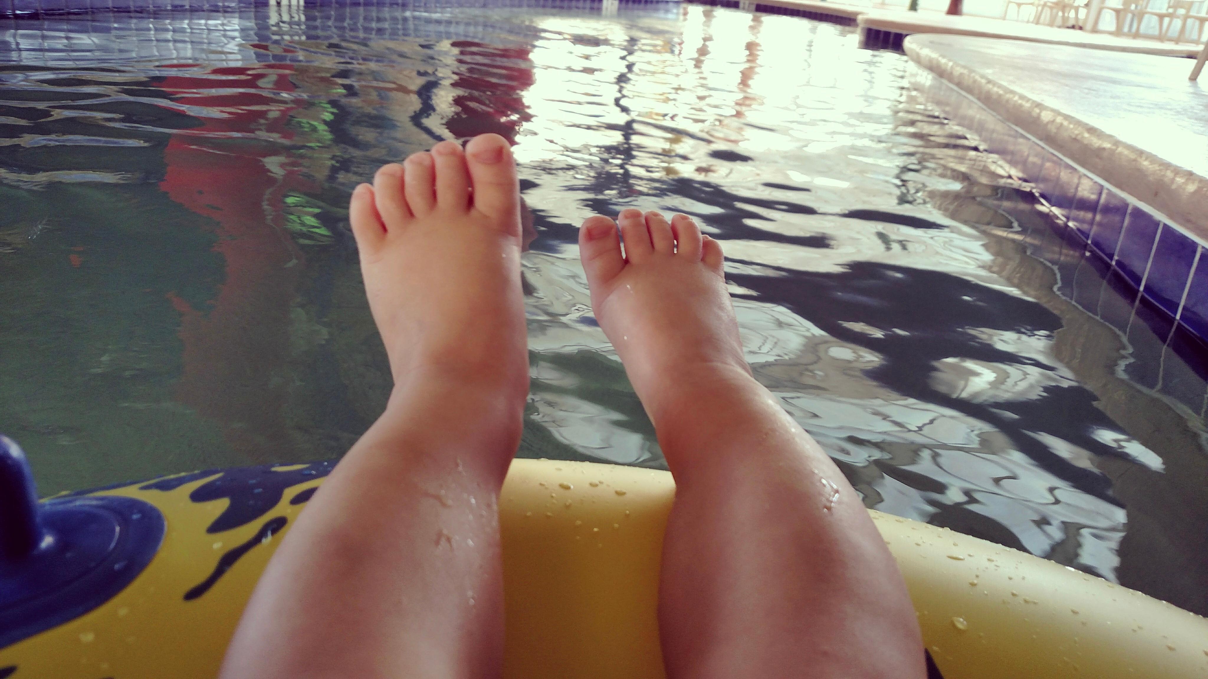 My toddler, floating the lazy river.