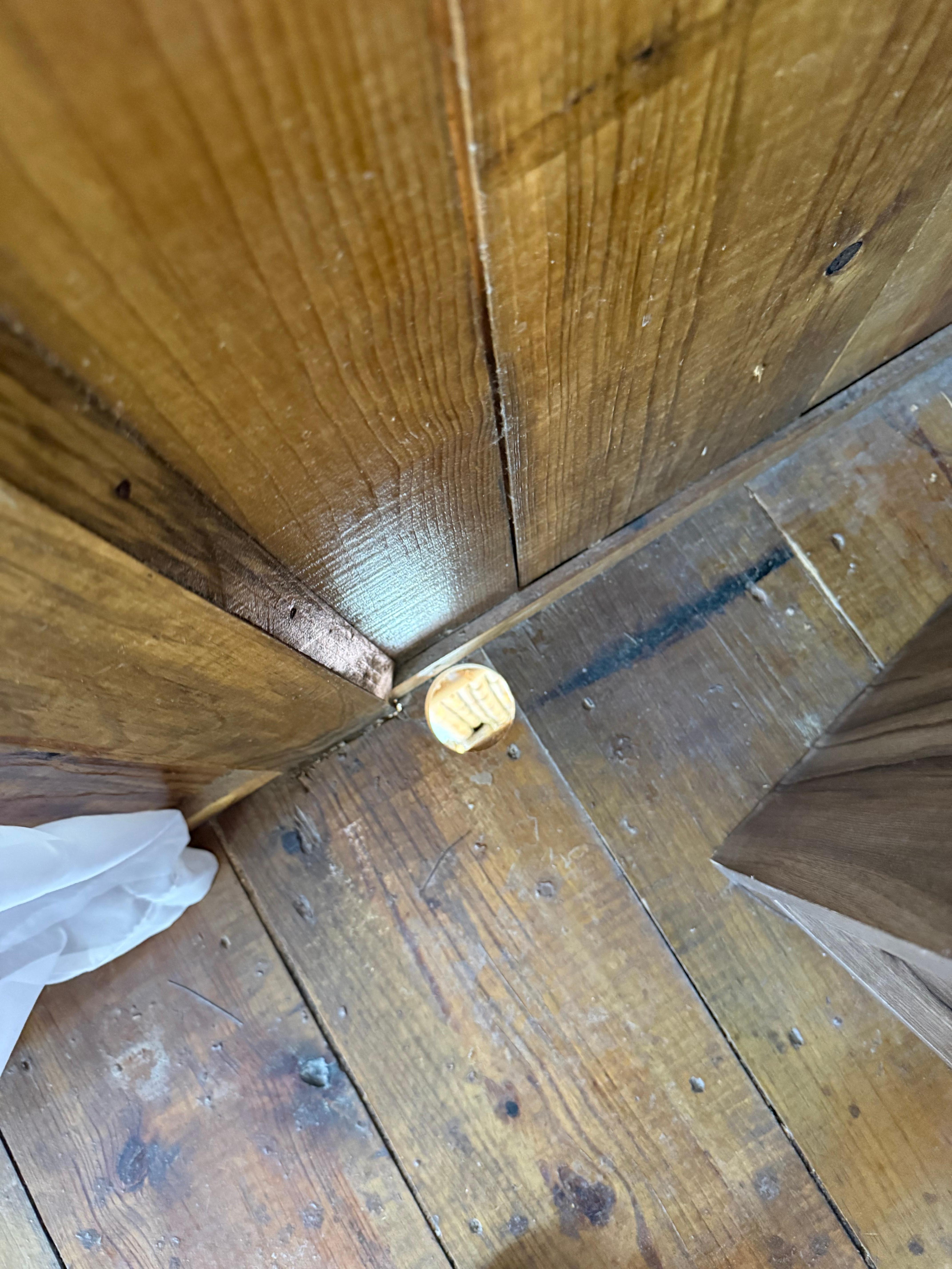 A hole on the floor of the cabin. 