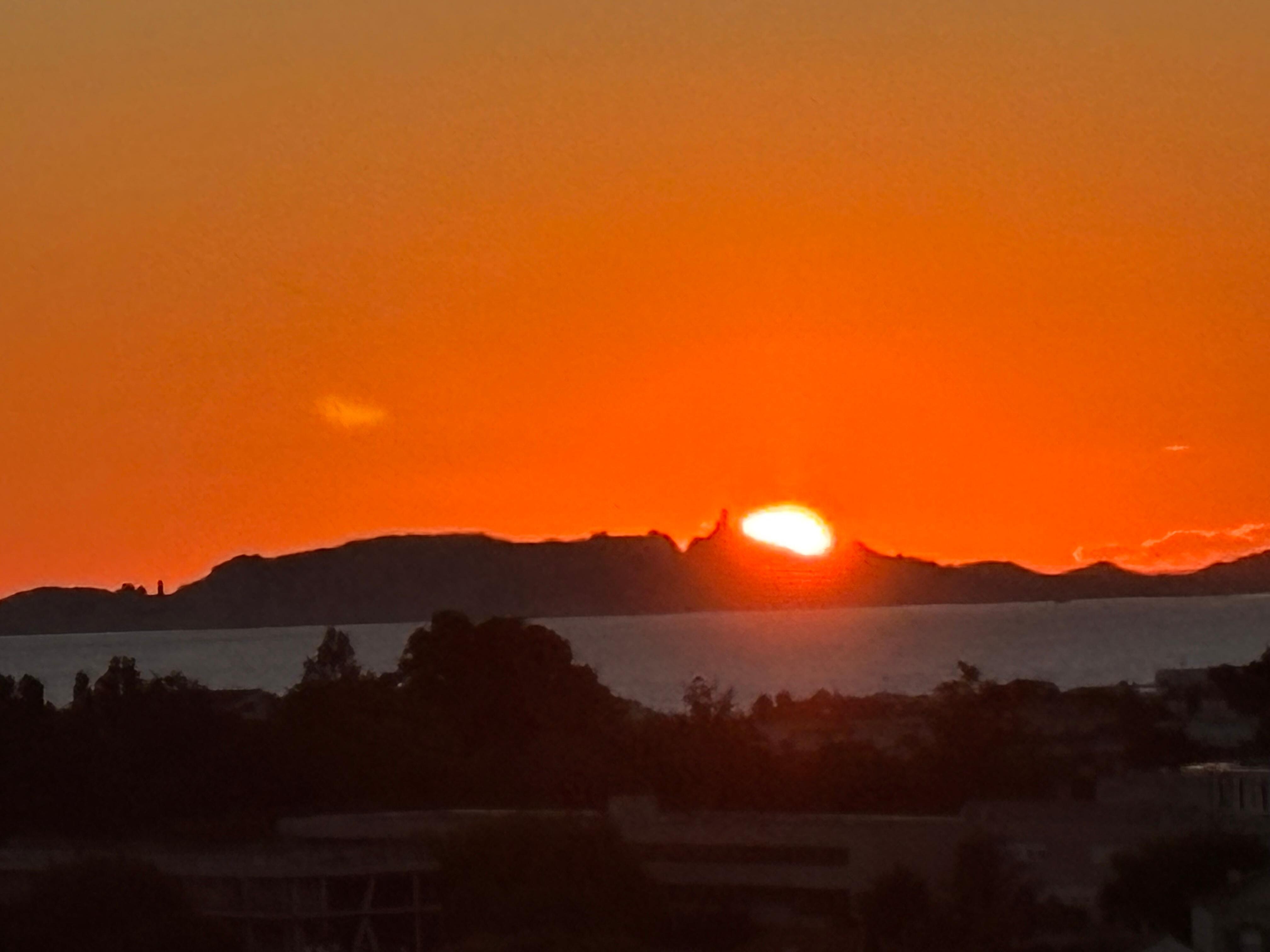 The sunset from the property’s balcony.