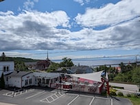 Vue depuis le balcon sur la plage de Tadoussac