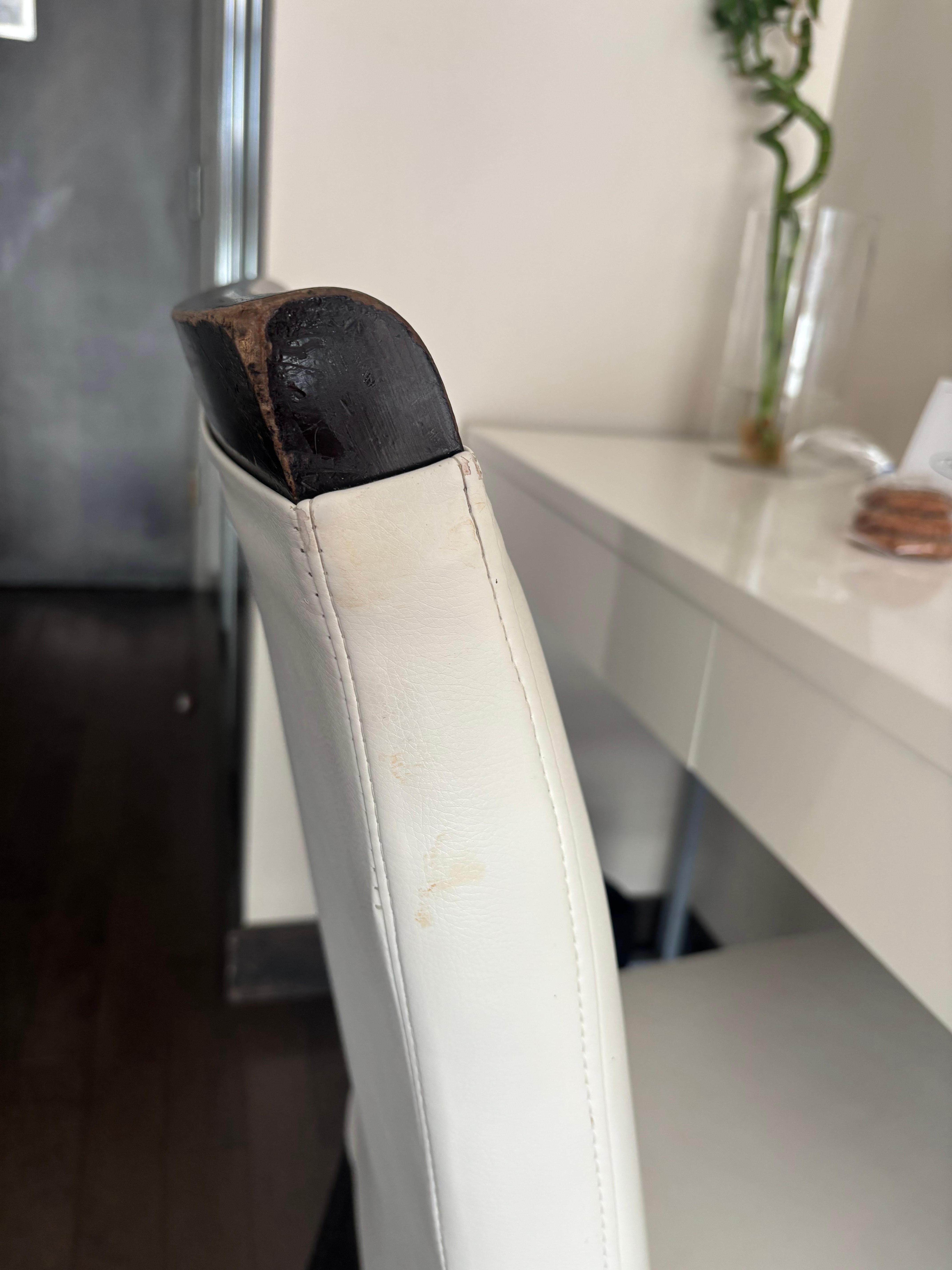 Only chair in room stained and dirty look