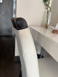 Only chair in room stained and dirty look