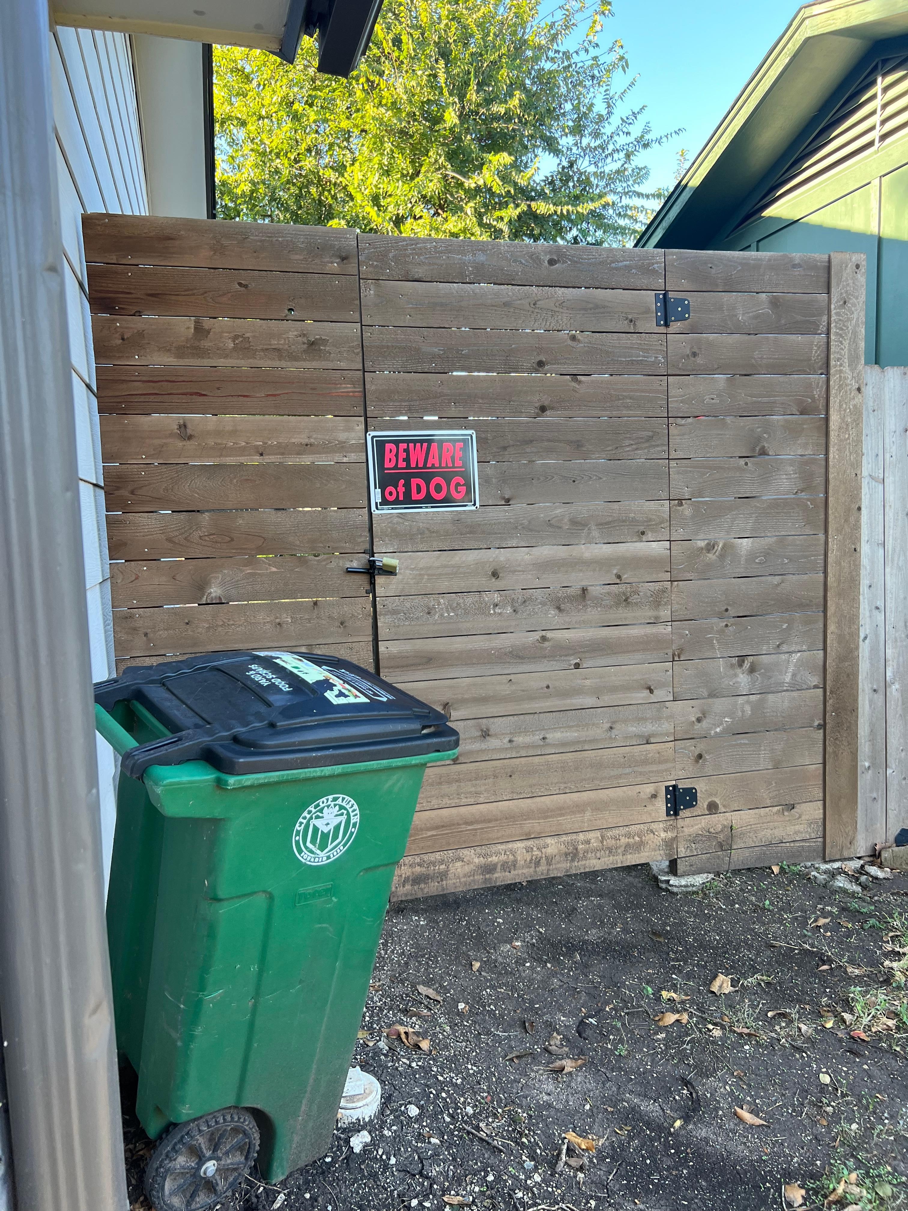 Padlocked. No one can get in the backyard and sneak up on you!💯 Also the backyard is really big! We loved it!