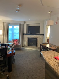 The living room fireplace is great. Sofa is uncomfortable