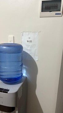 The wrong (fake) WiFi password displayed on the wall