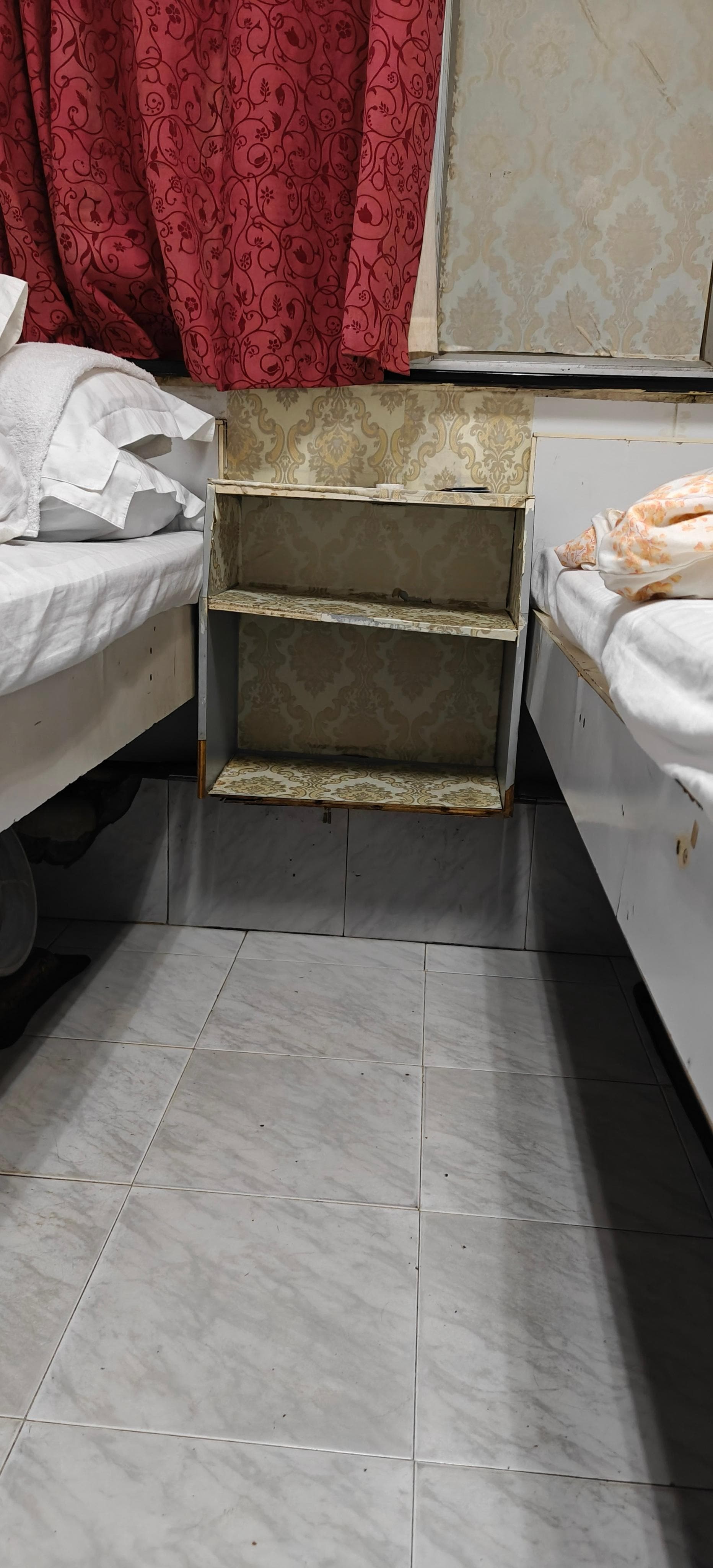 Inside of the room. The room has a strong smell. With occasional bugs.  