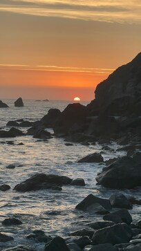 Sunset from the beach below the condo.