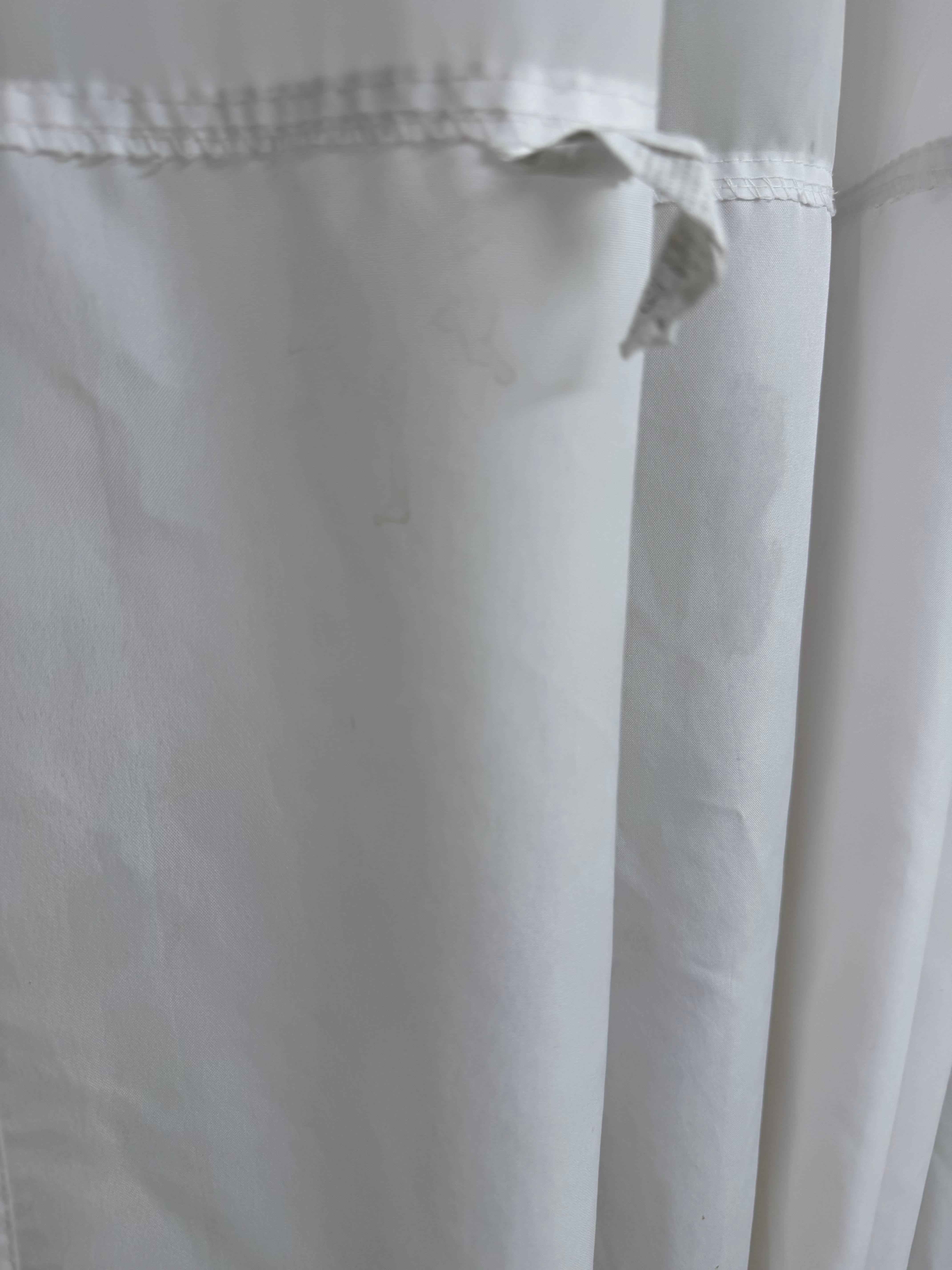 Unclean, dingy and stained shower curtain needs to be replaced. 