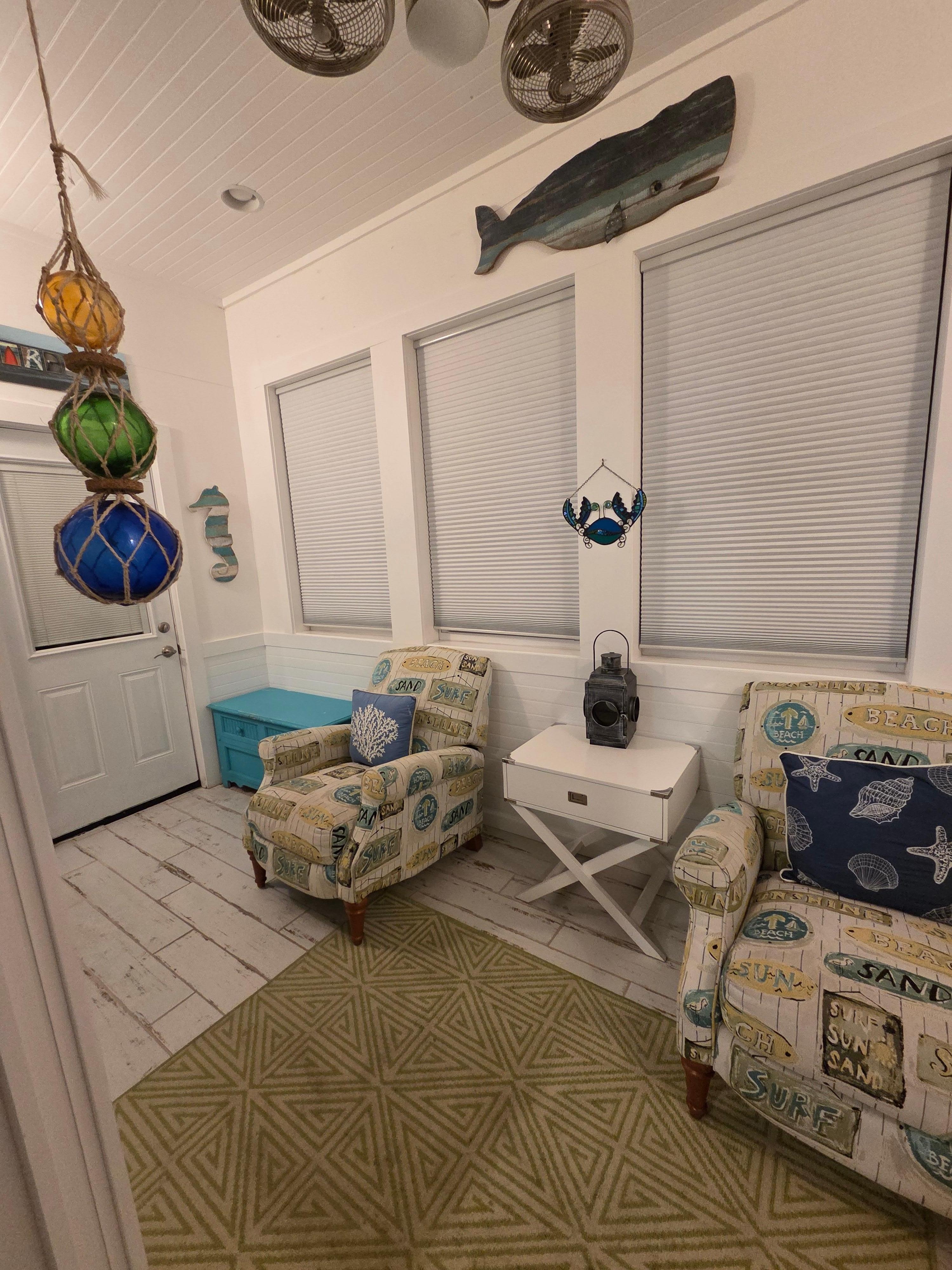 Cozy reading spot off our room is an enclosed patio