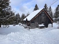 View from driveway, lots of snow