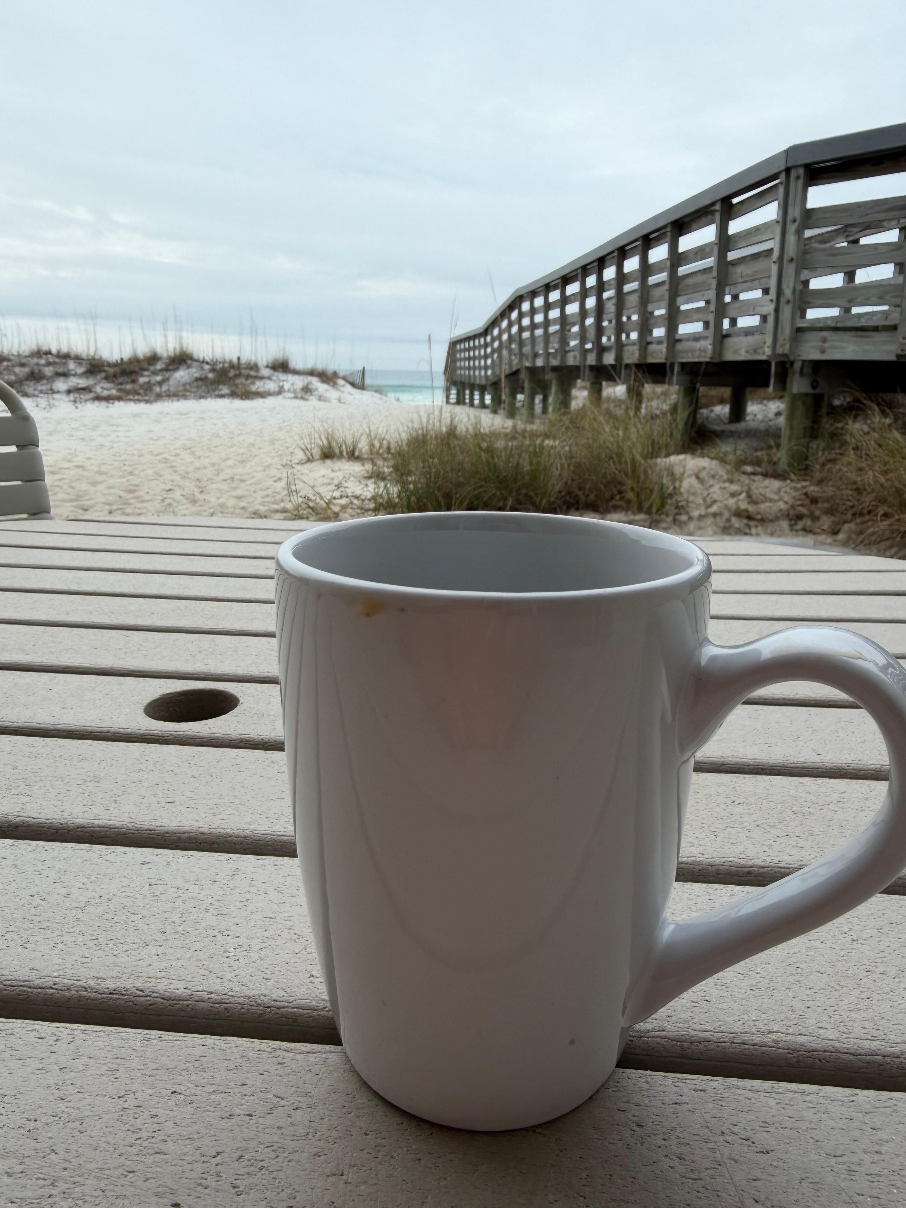 Sitting on the patio steps from the water