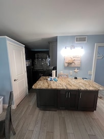 Kitchen area and washer and dryer