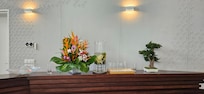 Reception with fresh flowers and infused water