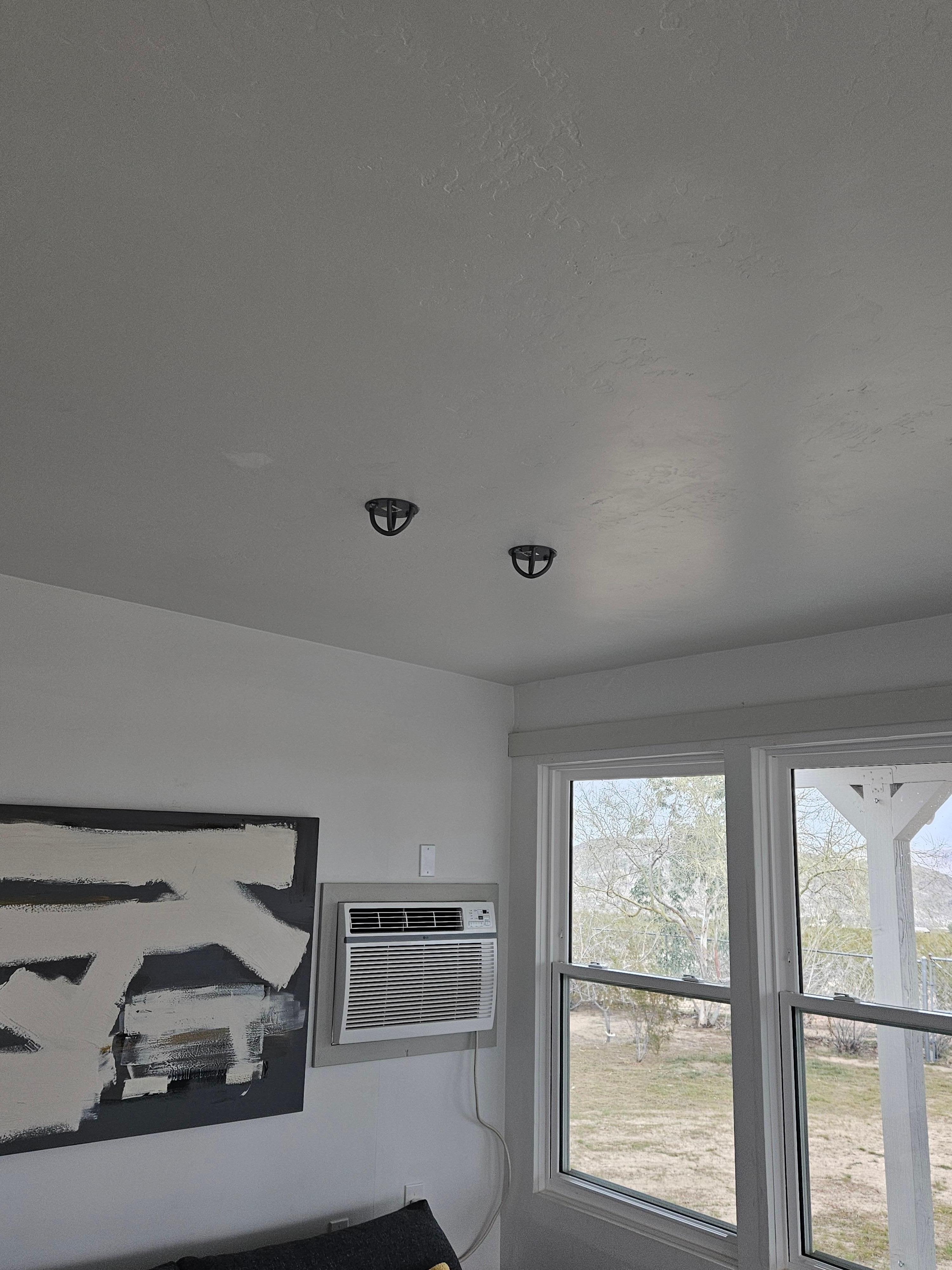 Other than one blind in the bathroom, there are no blinds in this house.  Add that to the fact that there are cameras surrounding the house gives a creepy, watched feeling.  And what are those heavy duty hooks in the ceiling for?