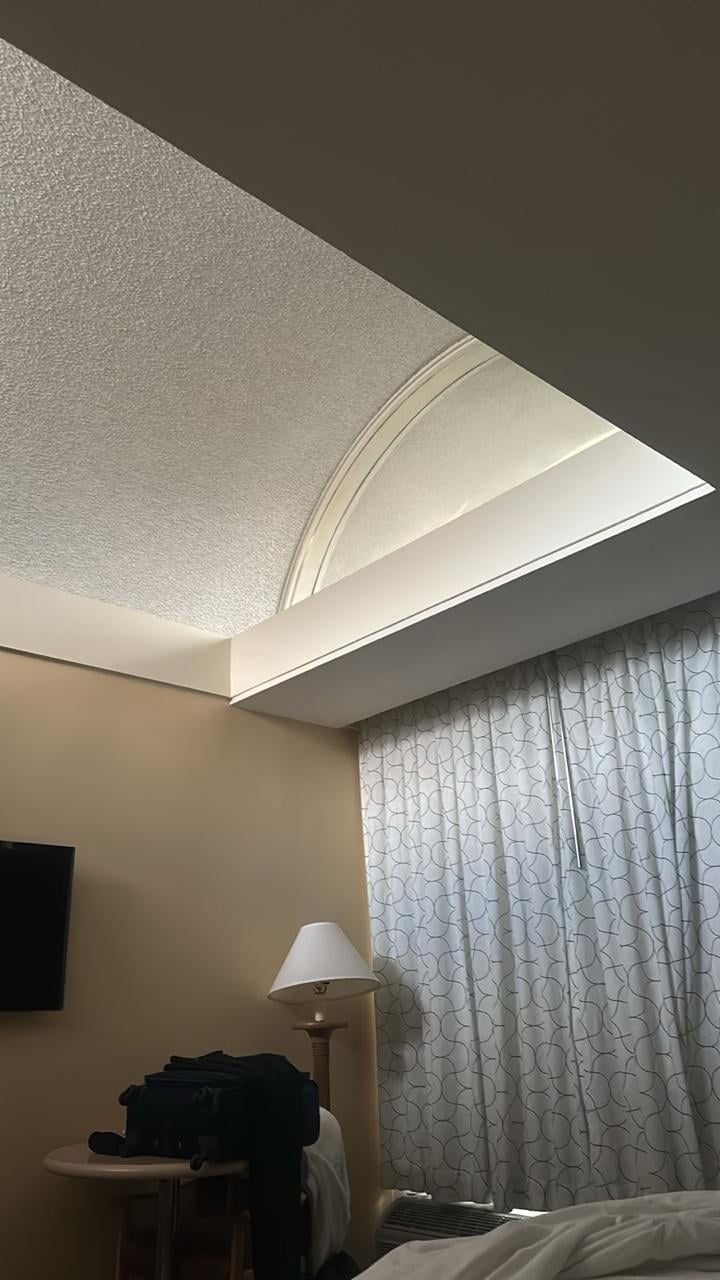 Fechamento em vidro acima da janela