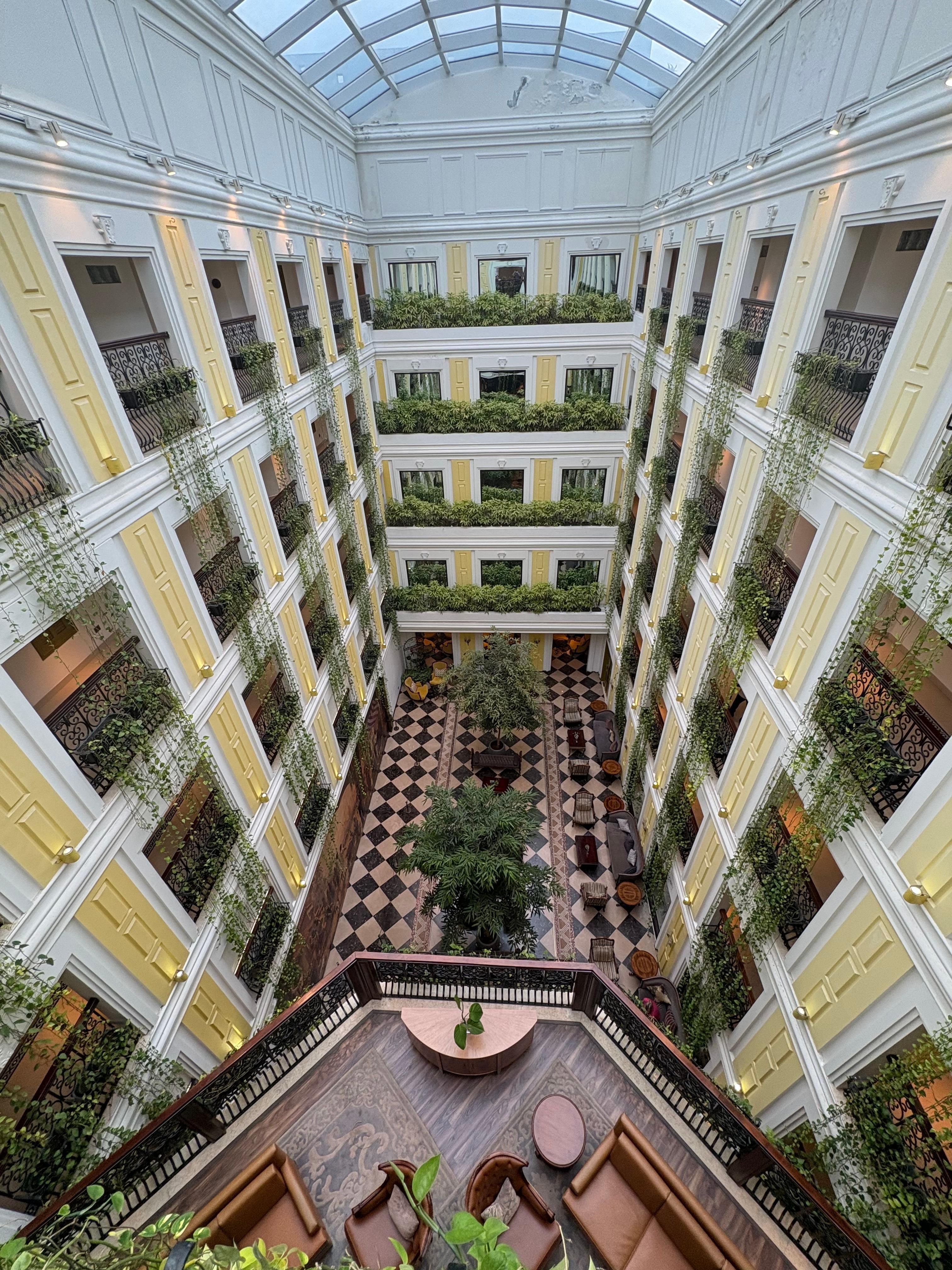 Looking down over library balcony from upper floor common area.