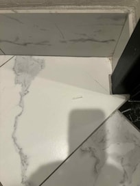 Plastic that remained in the same place on the bathroom floor our entire stay at the Paris Hotel Las Vegas Suite 7211