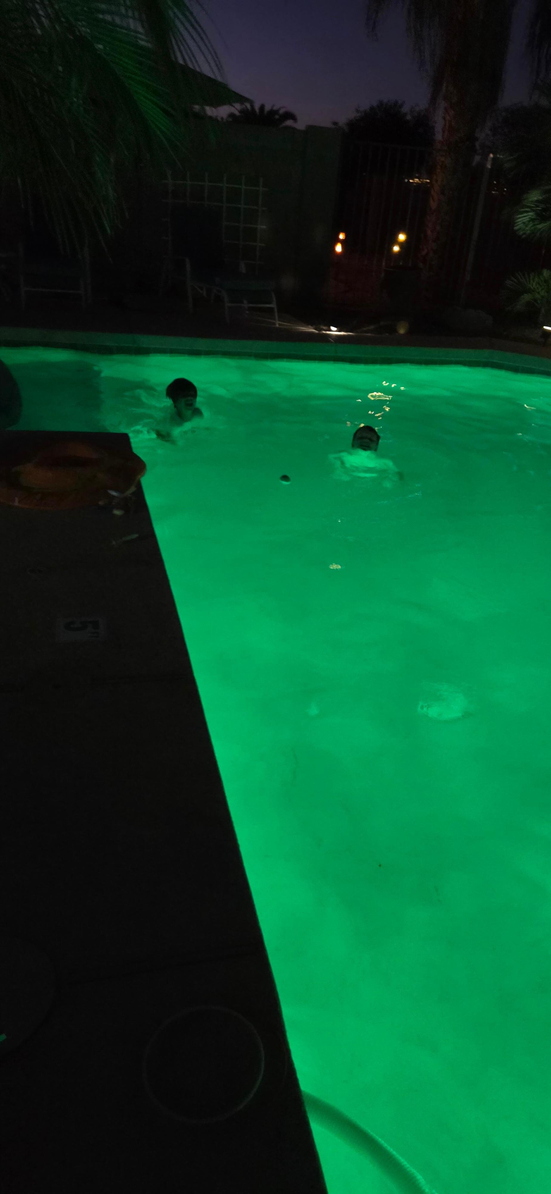 Night swimming in the changing pool colors 