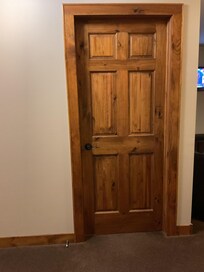 Beautiful knotty pine doors throughout the property.