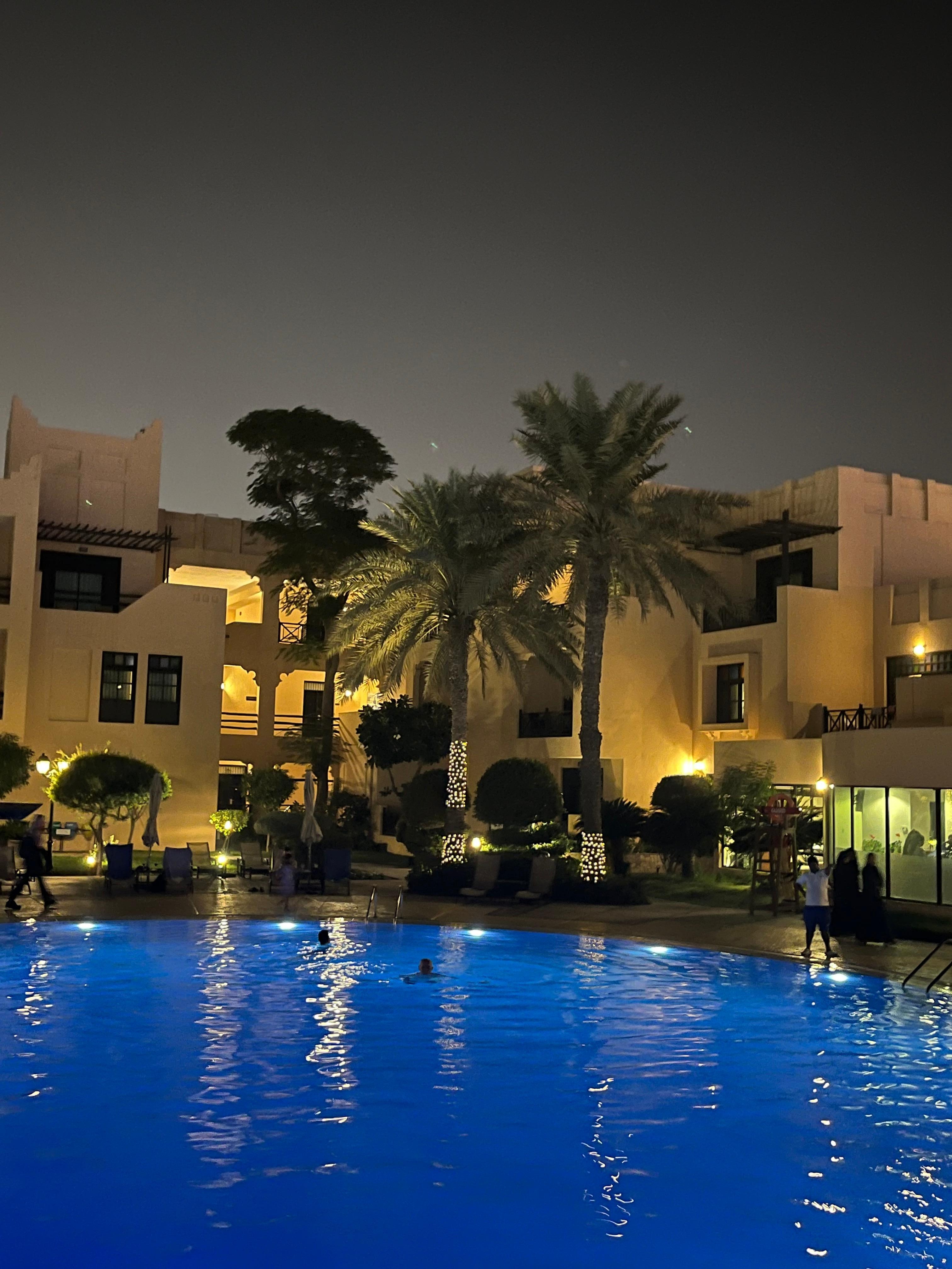 The pool area at night. 