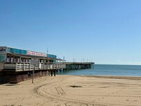 Very close to the fishing pier.