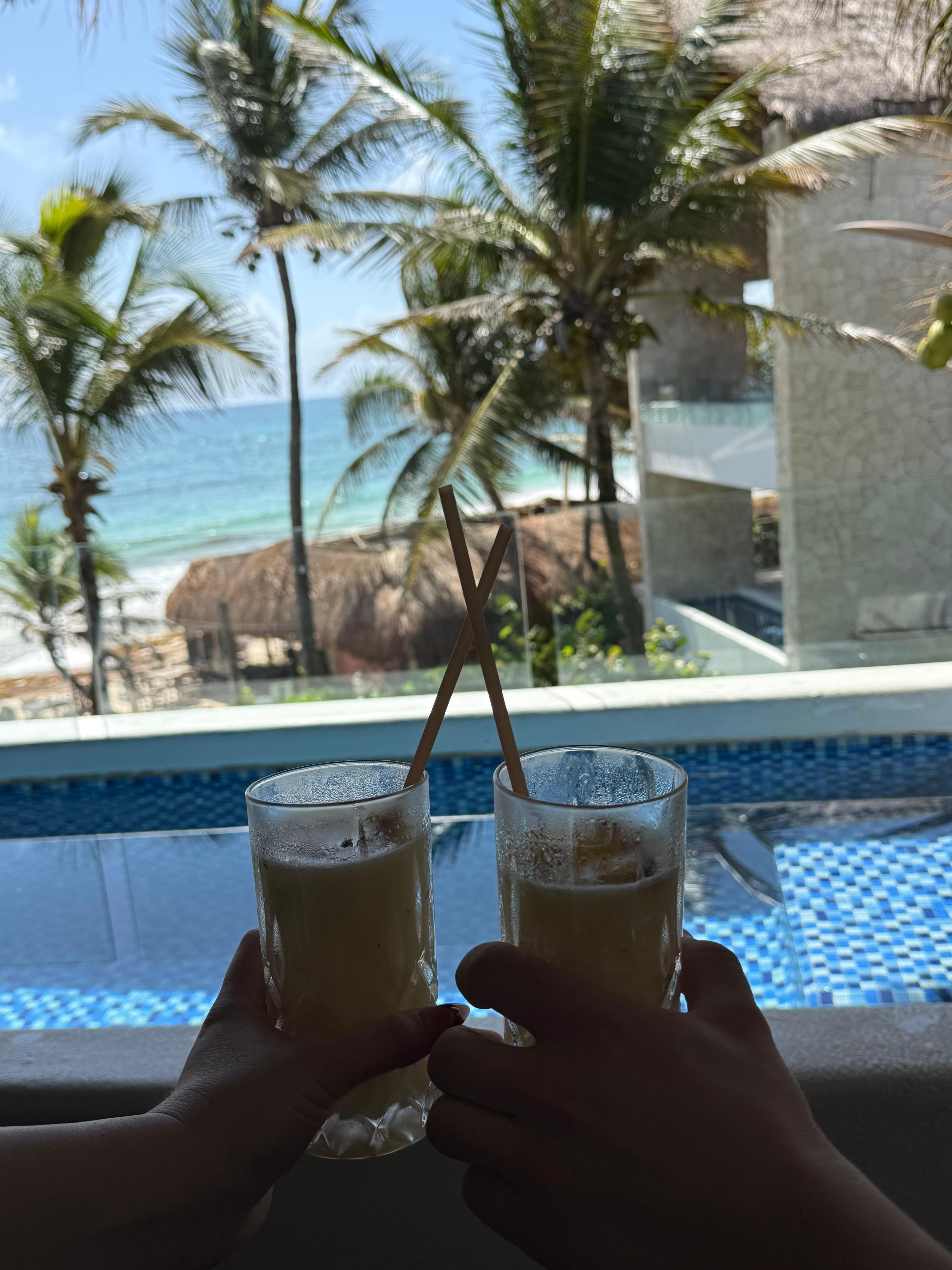 Drinks at our private pool with the ocean view. 