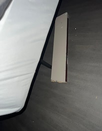 This is the wood piece they used to prop the bed with.