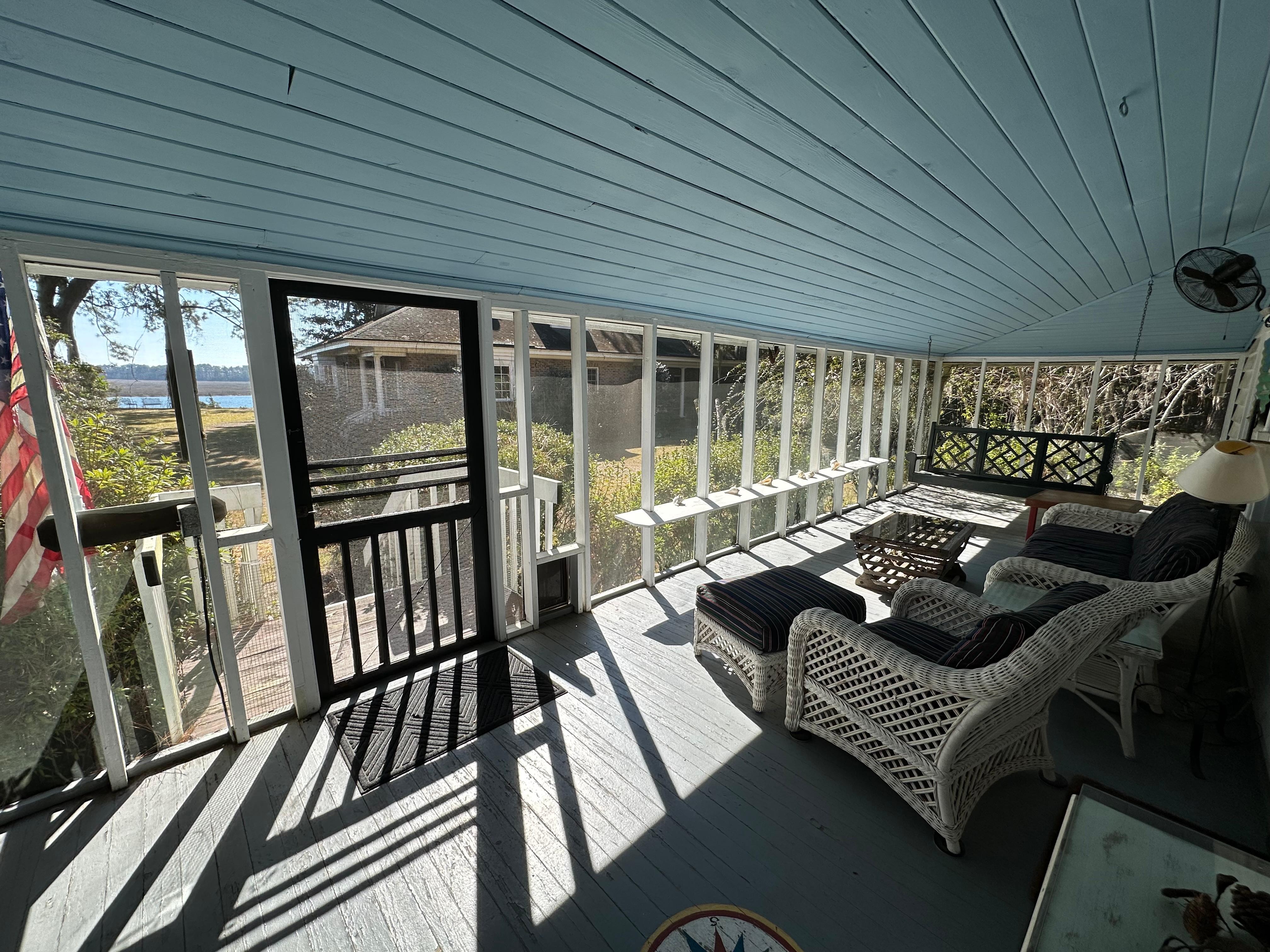 View of Okatie River through the porch. Note: the owners’ house is the other house in the picture. 