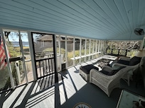 View of Okatie River through the porch. Note: the owners’ house is the other house in the picture.