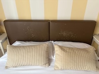 Scratched and worn out headboard