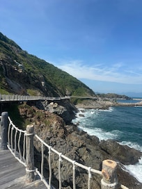 Rickety boardwalk to water sports.