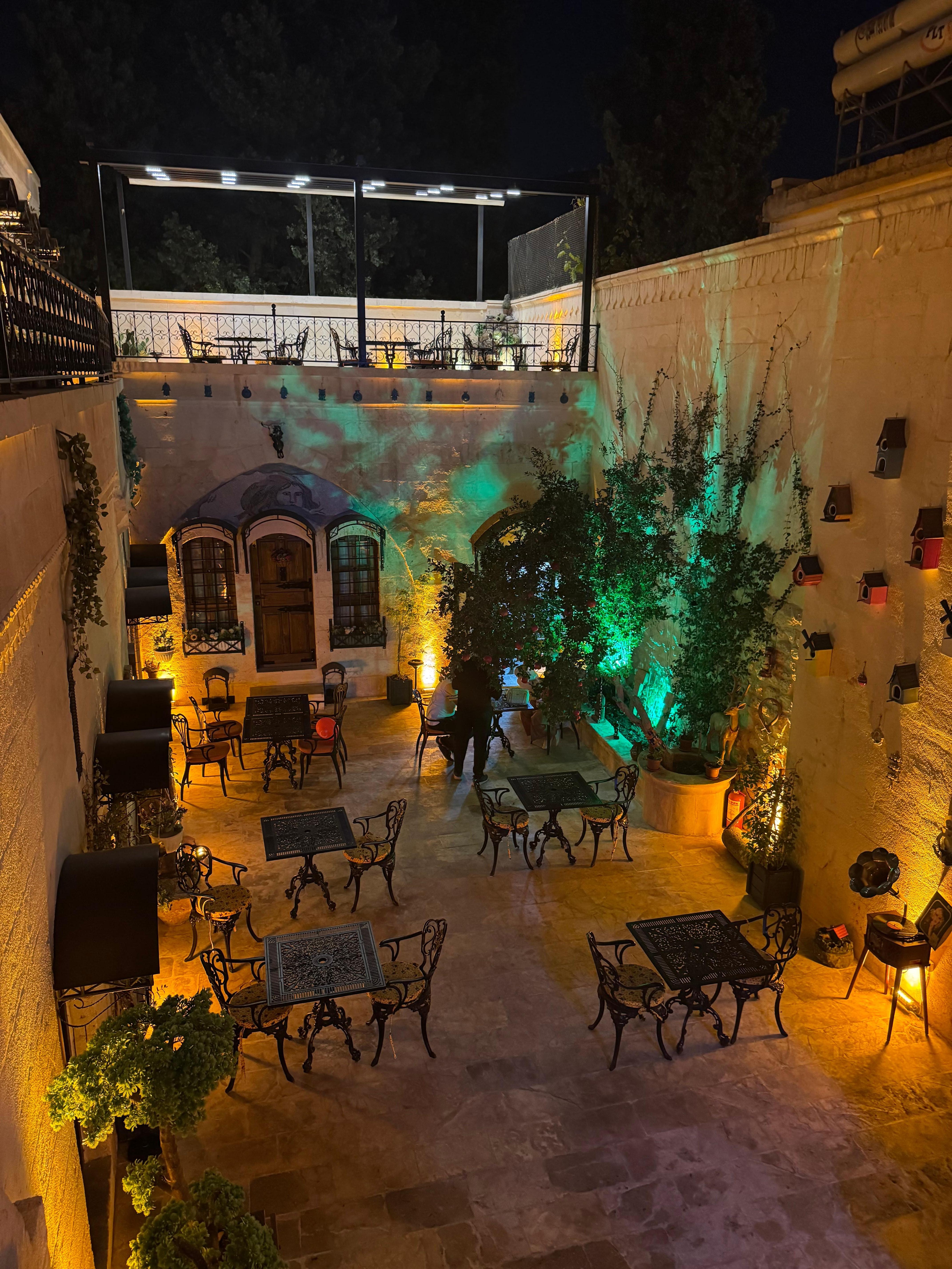 The hotel courtyard at night