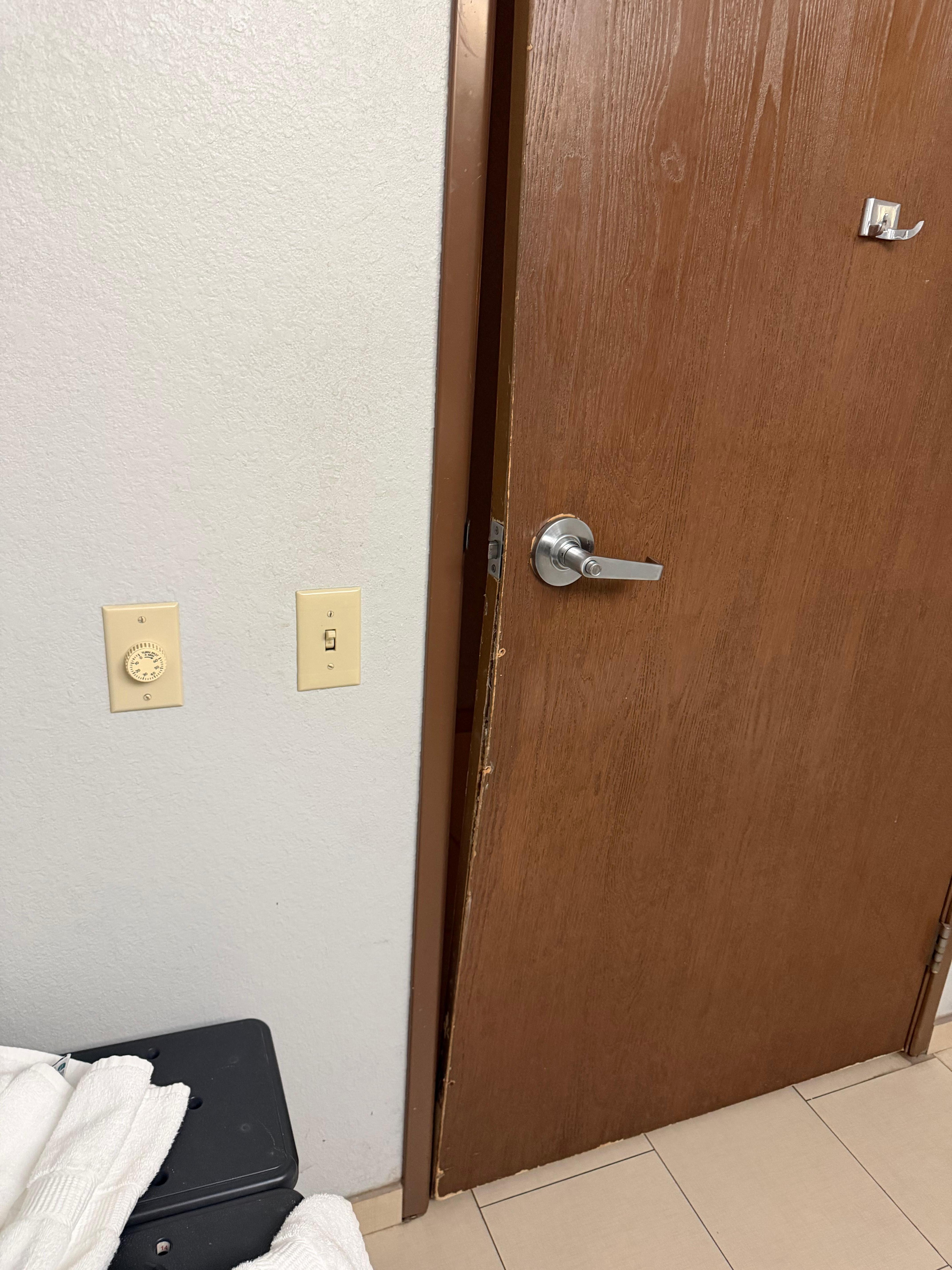 Light switches below door handle 